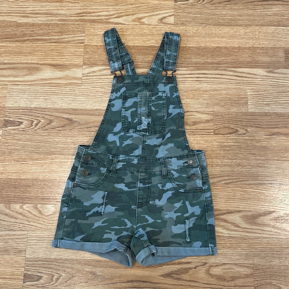 Camouflage colored short overalls from Justice